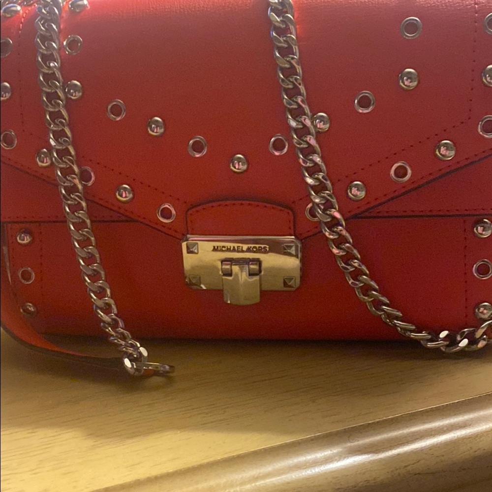 Michael Kors Red Studded Chain Shoulder Bag
Like Brand New. Only Carried 1 Time